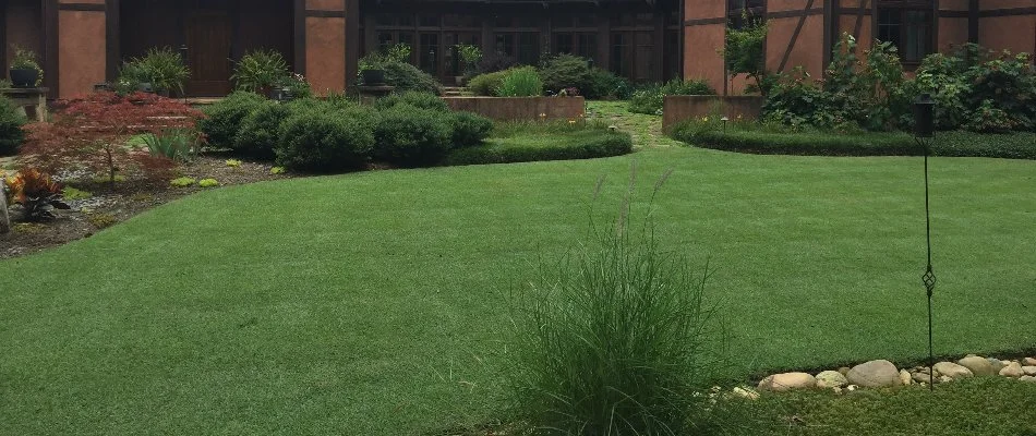 A large house in Bethlehem, GA, with a landscape and healthy lawn.